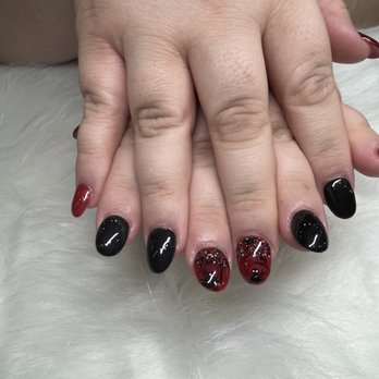 R A Nails - Full set with Gel manicure and a Halloween design on two fingers. Loved it! - Nail Salons Near Me - Roseville, California R A Nails - Full set with Gel manicure and a Halloween design on two fingers. Loved it! - Nail Salons Near Me - Roseville, California