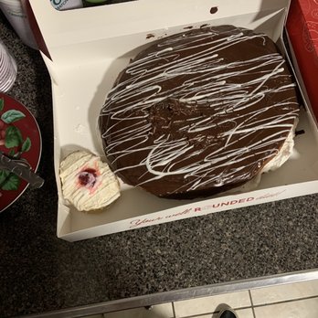 Beiler's Bakery - Their giant dream cream donut next to their regular sized peanut butter jelly donut - Bakeries Near Me - Philadelphia, Pennsylvania