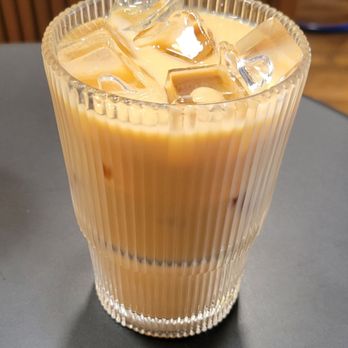 Ondo Coffee - PEACH ROYALE (SEASONAL) - Organic black peach tea, cane sugar, organic oat milk, cold steeped for 18 hours - Coffee & Tea Near Me - Los Angeles, California Ondo Coffee - PEACH ROYALE (SEASONAL) - Organic black peach tea, cane sugar, organic oat milk, cold steeped for 18 hours - Coffee & Tea Near Me - Los Angeles, California