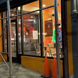 Exterior outside entrance of G's Cheesesteaks - Entrance is an obstructed view .It literally the corner of B/Houston - New York, New York Exterior outside entrance of G's Cheesesteaks - Entrance is an obstructed view .It literally the corner of B/Houston - New York, New York