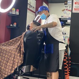 My baby boy getting his hair cut by the best !