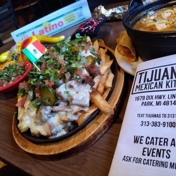 Tijuana's Mexican Kitchen - I named this Mexican Poutine OMG, it's loaded fries topped with Chunky Beef. Absolutely a must try, just ask for it . - Mexican Near Me - Lincoln Park, Michigan Tijuana's Mexican Kitchen - I named this Mexican Poutine OMG, it's loaded fries topped with Chunky Beef. Absolutely a must try, just ask for it . - Mexican Near Me - Lincoln Park, Michigan
