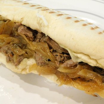 Eriks Deli - Pot Roast Panini is the most delicious sandwich you can ever experience caramelized onions, swiss cheese and horseradish mayo - Sandwiches Near Me - Lisle, Illinois