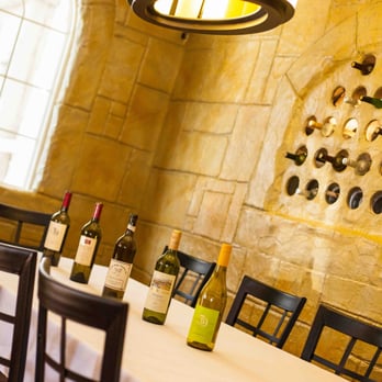 Joseph's Restaurant - a table with wine bottles on it - American Near Me - Peckville, Pennsylvania
