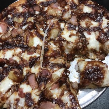 Big Dons Pizza - a large pizza on a pan - Pizza Near Me - Price, Utah