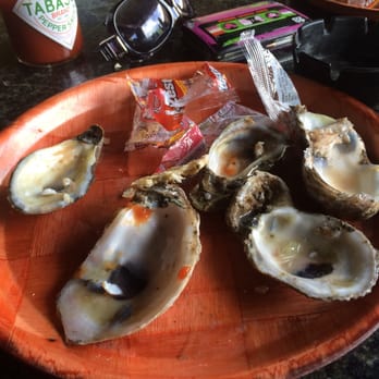 Rusty's Raw Bar and Grill - Naples - These used to be oysters - Bars Near Me - Naples, Florida