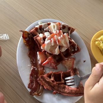 The Wafflery -  Ferry Rd - Red velvet waffle with cream cheese drizzle and strawberries - Waffles Near Me - Charlotte, North Carolina