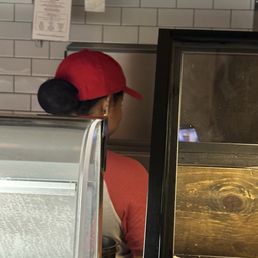 Two employees looking at TikTok's instead of working on our order Two employees looking at TikTok's instead of working on our order