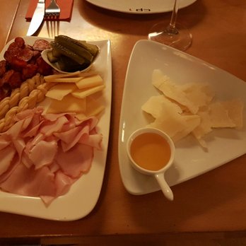 CP1 Café - Tapas plate and hard cheese with honey - Wine Bars Near Me - Prague, Puerto Rico CP1 Café - Tapas plate and hard cheese with honey - Wine Bars Near Me - Prague, Puerto Rico