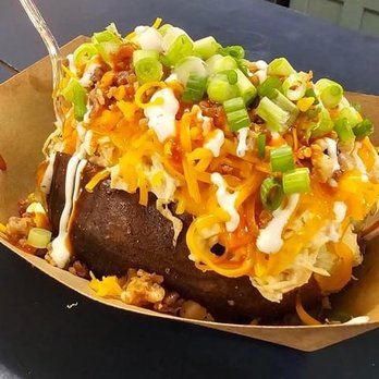 Deez Spudz - a baked potato topped with cheese and green onions - Food Trucks Near Me Deez Spudz - a baked potato topped with cheese and green onions - Food Trucks Near Me