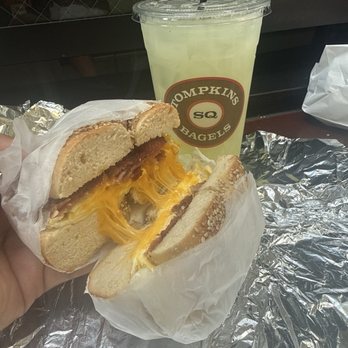 Tompkins Square Bagels - 2nd Ave - Turkey bacon egg and cheese on a toasted sesame bagel - Bagels Near Me - New York, New York Tompkins Square Bagels - 2nd Ave - Turkey bacon egg and cheese on a toasted sesame bagel - Bagels Near Me - New York, New York