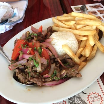 Chalan on the Beach - Lomo Saltado in its amazing juices - Latin American Near Me - Miami Beach, Florida Chalan on the Beach - Lomo Saltado in its amazing juices - Latin American Near Me - Miami Beach, Florida