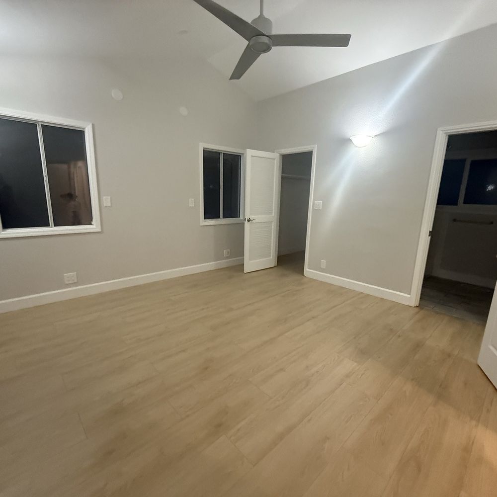 Private Diamond Flooring - One of the bedrooms flooring done and baseboards replaced and caulked but not painted as requested - Flooring Near Me Private Diamond Flooring - One of the bedrooms flooring done and baseboards replaced and caulked but not painted as requested - Flooring Near Me