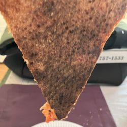 Frankies NY Pizza - First piece from yesterday; there were others that were darker. Best part of the pizza, that tip of the slice into the first 3 inches.