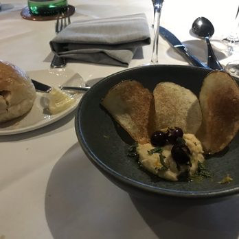 Mizuna - Chips and hummus, blueberry on the top. - New American Near Me - Denver, Colorado Mizuna - Chips and hummus, blueberry on the top. - New American Near Me - Denver, Colorado