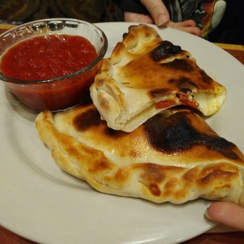 Richard's Brick Oven Pizza - Ham and pepperoni Calzone from the "build your own" option. - Pizza Near Me - Franklin, Indiana Richard's Brick Oven Pizza - Ham and pepperoni Calzone from the "build your own" option. - Pizza Near Me - Franklin, Indiana