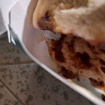 Cinnabon - a close up of a piece of bread - Bakeries Near Me - Elk Grove, California