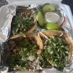 Guacamole Tacos - Chicken Tacos with cilantro, onions, salsa & cheese