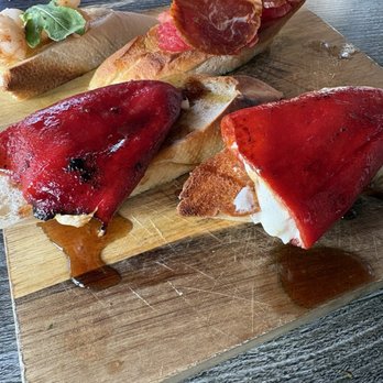 Patio Tapas and Beer - Piquillo relleno, roasted red pepper stuffed with goat cheese - Tapas/Small Plates Near Me - Boca Raton, Florida Patio Tapas and Beer - Piquillo relleno, roasted red pepper stuffed with goat cheese - Tapas/Small Plates Near Me - Boca Raton, Florida