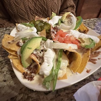 Don Juan Bar & Grill - "Botana" which is like nachos, but with much larger cuts of the toppings. Almost like a deconstructed torta? Very good. The chorizo is great - Mexican Near Me - Toledo, Ohio