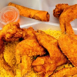 Sunshine Chicken and Seafood - Wings, fried rice, and seafood eggroll.