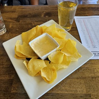 The Taylor County Taphouse - Chips and queso - Bars Near Me - Abilene, Texas
