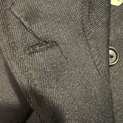 Ideal uniforms - Loose strings and unfinished button holes