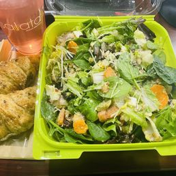 Regular-sized salad with two croissants and a Prickly Pear and Peach Lemonade drink Regular-sized salad with two croissants and a Prickly Pear and Peach Lemonade drink