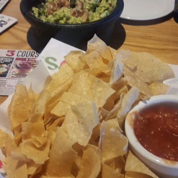 Chili's - Chips with fresh guacamole..and yes that's bacon on top of my guac (made in front of me) that's how it's done! - American Near Me - Oldsmar, Florida Chili's - Chips with fresh guacamole..and yes that's bacon on top of my guac (made in front of me) that's how it's done! - American Near Me - Oldsmar, Florida