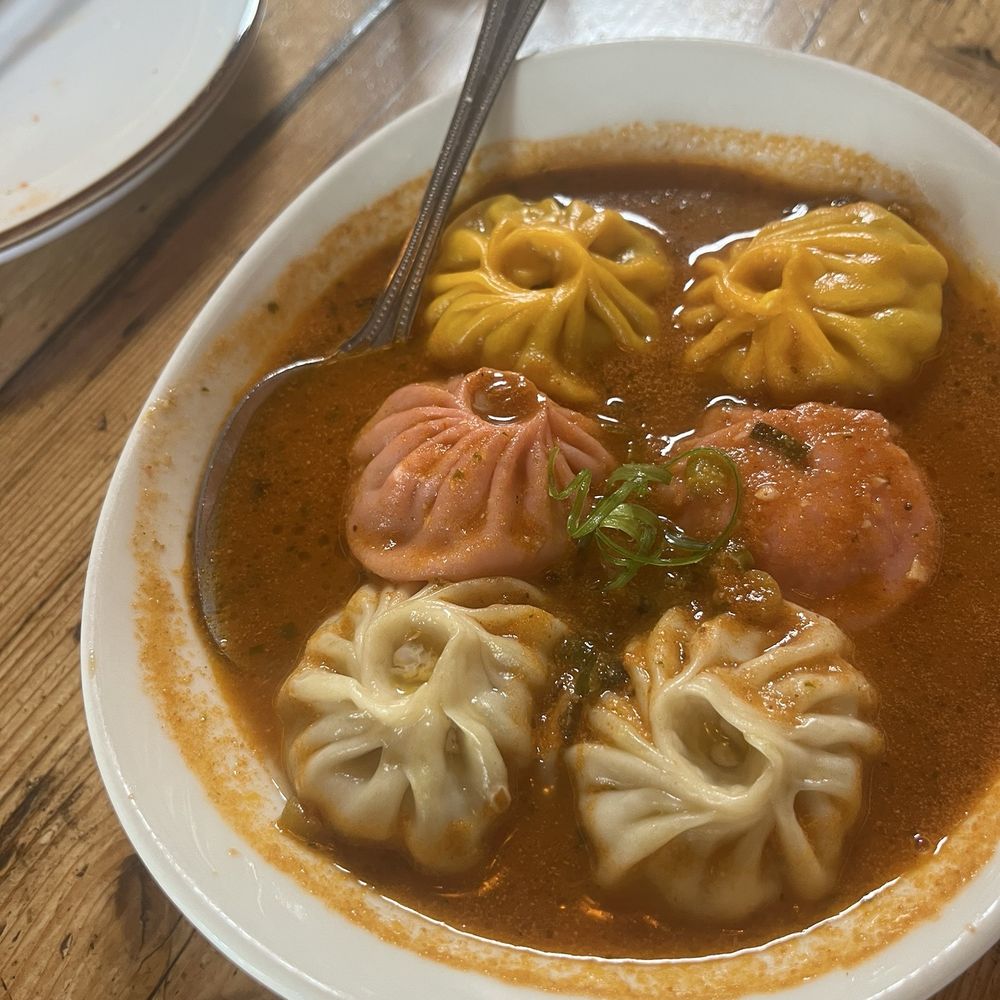 MoMo....dumplings filled with goodness, floating in goodness. MoMo....dumplings filled with goodness, floating in goodness.