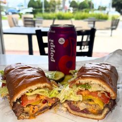 Central Liquor & Deli - The perfect pair  -- The Willie stacked with Boar's Head meats + a cold Poppi. Fresh, fast, and made daily in Coronado!