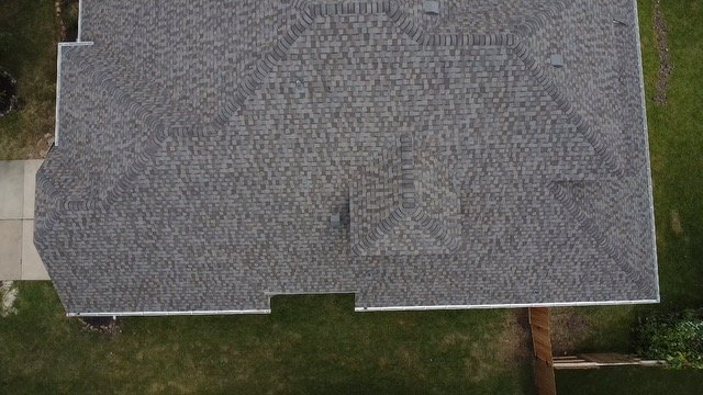 Slide of Rhodes Roofing Services