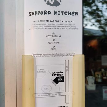 Sapporo Kitchen - Exterior with menus for taking home - Japanese Near Me - Surrey, British Columbia