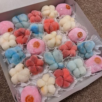Two Ladies Kitchen - Pink with stamp is brownie, blue butterfly is azuki with white chocolate chips, white flower was peanut butter cup, red flower is koshi - Bakeries Near Me - Hilo, Hawaii Two Ladies Kitchen - Pink with stamp is brownie, blue butterfly is azuki with white chocolate chips, white flower was peanut butter cup, red flower is koshi - Bakeries Near Me - Hilo, Hawaii