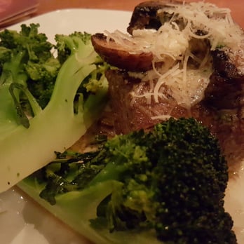 Outback Steakhouse - Victoria's filet mignon portabella- topped with Bistro butter, portabella mushrooms and Parmesan cheese - Steakhouses Near Me - Henderson, Nevada