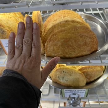 Milohas - Reference of hand with large empanada, they were huge and tasty! - Bakeries Near Me - San Jose, California Milohas - Reference of hand with large empanada, they were huge and tasty! - Bakeries Near Me - San Jose, California