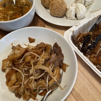 Jade Garden - Beef chow fun dry (1/3 is pictured), deep fried sesame balls, Steamed bbq pork buns, hot and Hot & Sour Soup (half pictured) - Dim Sum Near Me - Seattle, Washington Jade Garden - Beef chow fun dry (1/3 is pictured), deep fried sesame balls, Steamed bbq pork buns, hot and Hot & Sour Soup (half pictured) - Dim Sum Near Me - Seattle, Washington