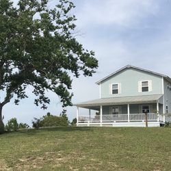Susie Q's Blues Berry Farm - Owners' house at the top of the hill - unbelievable views!
