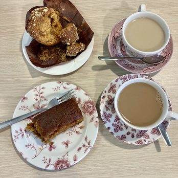 Herstmonceux Castle - Chestnuts Tea Room: Pumpkin & ginger cake, toffee apple muffin and tea for two. £9.75 - Landmarks & Historical Buildings Near Me