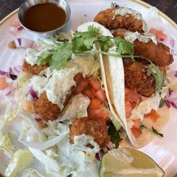 Fresh on Crawford - Squash tacos and side of hot sauce - Vegan Near Me - Toronto, Ontario Fresh on Crawford - Squash tacos and side of hot sauce - Vegan Near Me - Toronto, Ontario