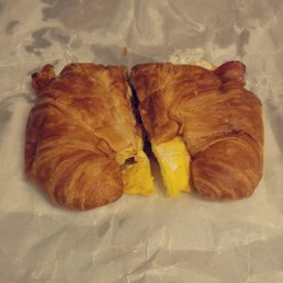 Bacon, egg, and cheese on a croissant.