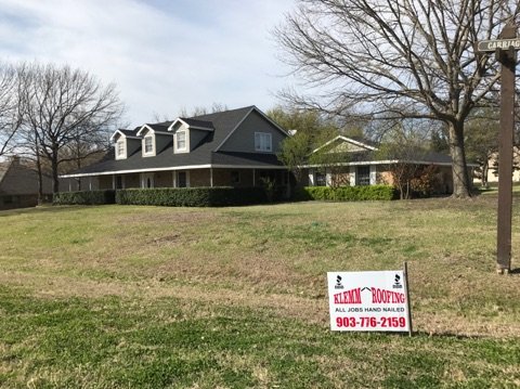 Slide of Klemm Roofing Company