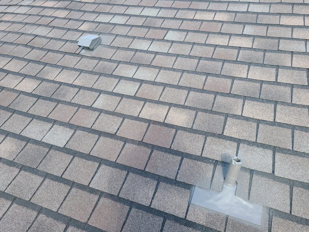 Slide of Bustamante Roofing and Construction