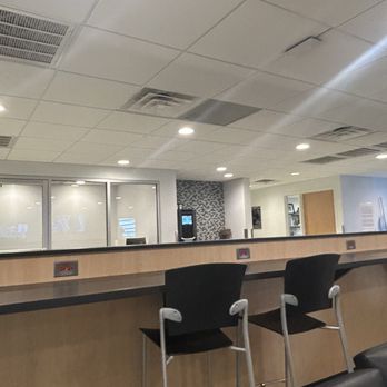 Jeff Gordon Chevrolet - Waiting area with a lot of plugs for charging - Car Dealers Near Me - Wilmington, North Carolina