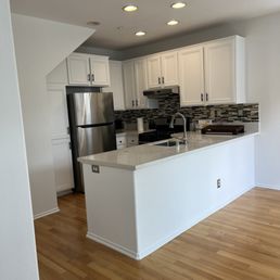 Kitchen cabinets all repainted inside and out with shelving added and new hardware. Walls all repainted. Kitchen cabinets all repainted inside and out with shelving added and new hardware. Walls all repainted.