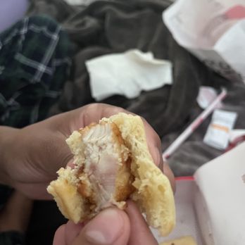 Chick-fil-A - ows a person holding a half eaten sandwich - Fast Food Near Me - White Settlement, Texas