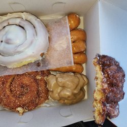 Manna Donuts - Covered Cinnamon rolls, maple old fashioned, bear claw, and I had her cut the apple fritter in half!