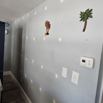 USA Insulation - This is my dining room wall. And the holes where filled poorly - Insulation Installation Near Me - Clearwater, Florida
