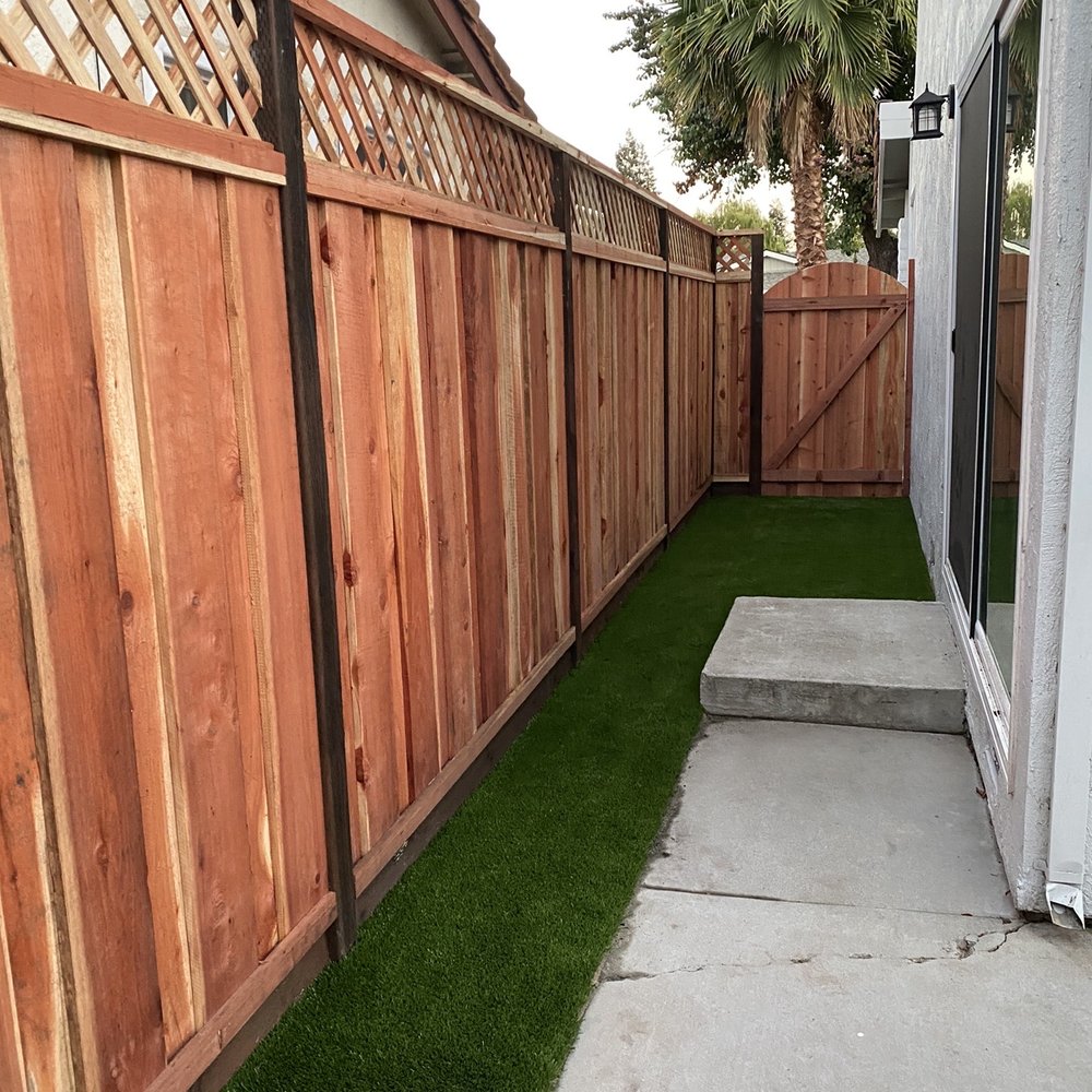Side yard turf and fence Side yard turf and fence