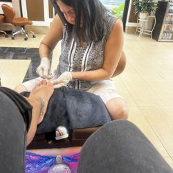 Mailisa Nail Spa - This woman cut my skin and buffed my toe skin off with a nail file.